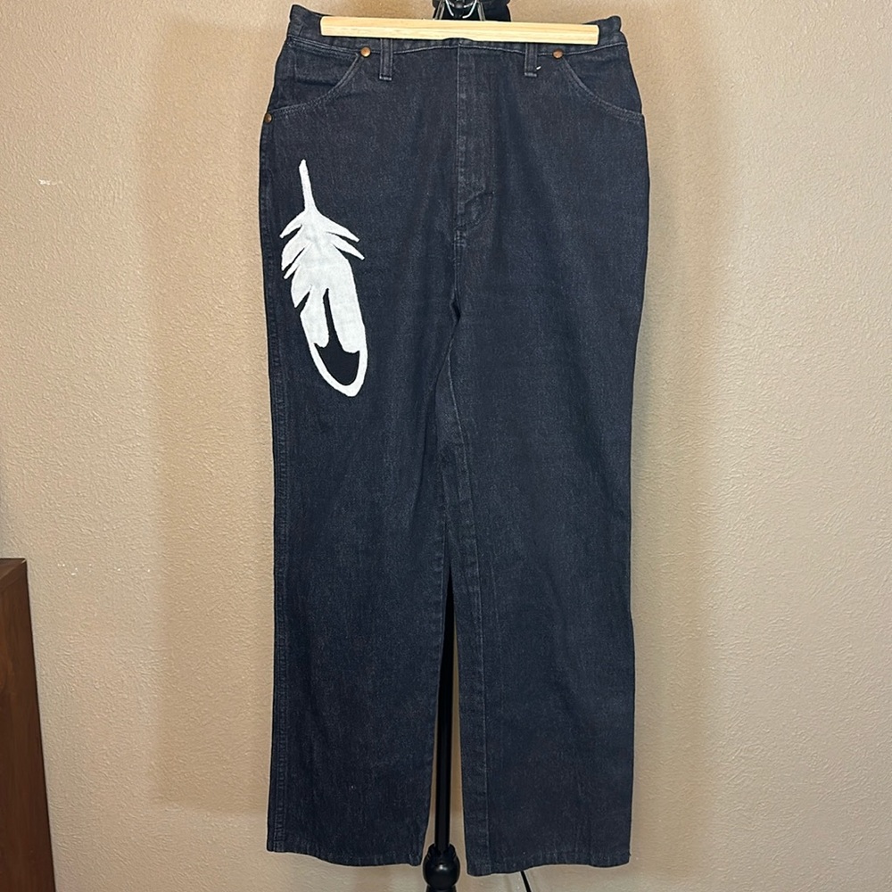 Medium black Wrangler jean with southwestern embellishment